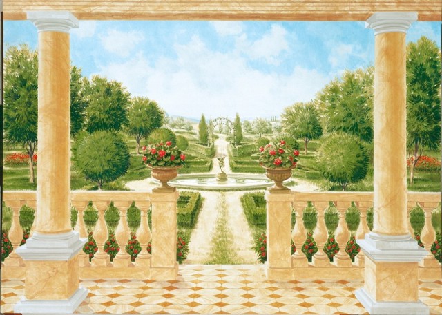 Панорамный вид через парадную античную арку на парк с цветами и деревьями вокруг фонтана